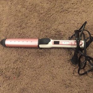 Pink curling wand with clamp